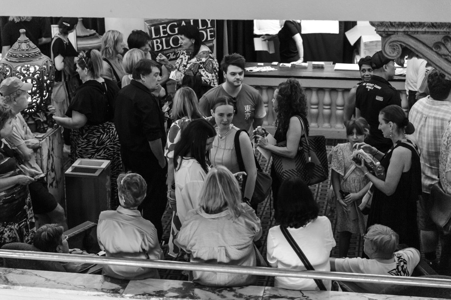 Untitled A crowd in the foyer of a theatre